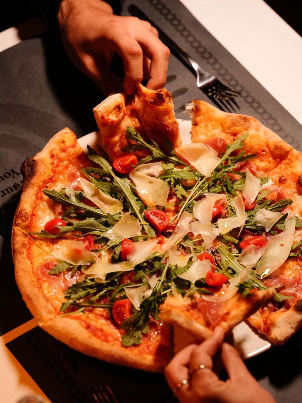 Fresh pizza at Corner Pizza and Grill